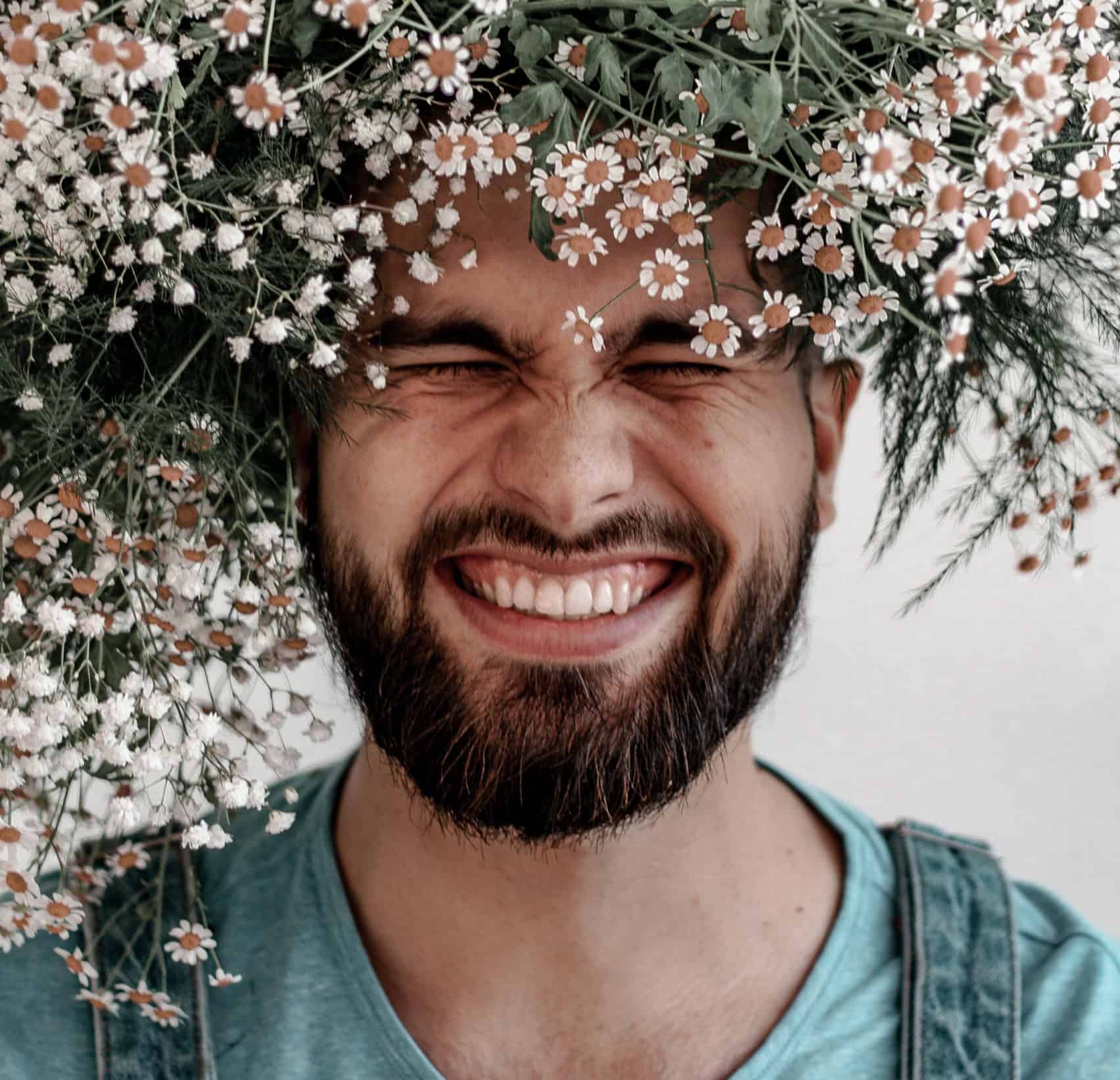 Man Smiling with White Teeth Man Smiling with Flowers