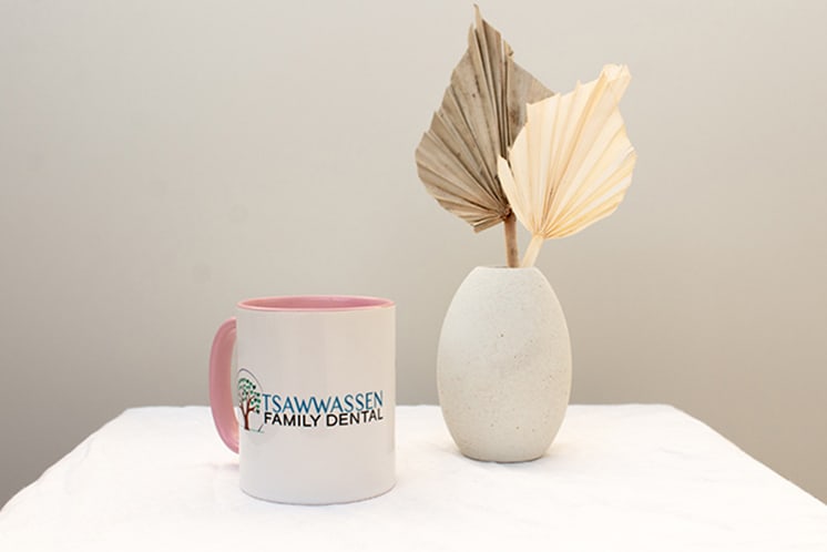 Tsawwassen family dental mug next to decor