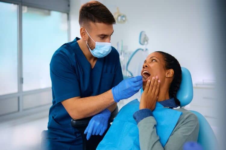 A picture of a dentist and a patient
