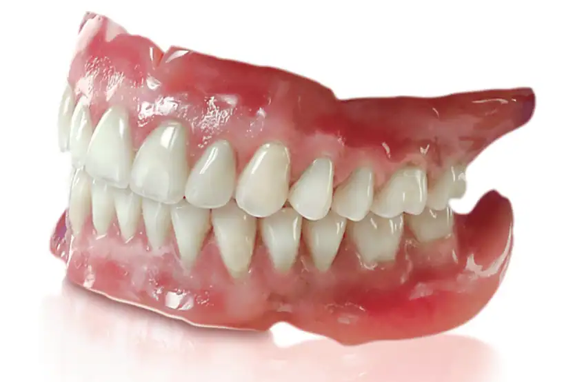 how to choose between dentures and dental implants