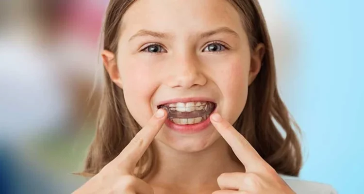 A picture of a child with invisalign